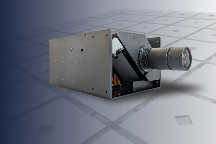 Industrial grade projection unit in a silver housing.